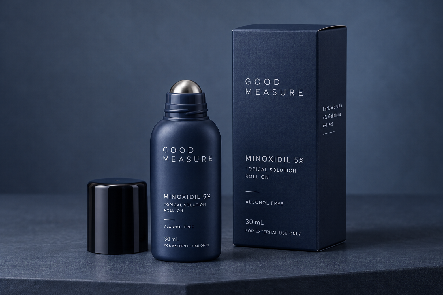 Good Measure Minoxidil 5% roll-on: midnight-blue bottle, black cap and matching carton